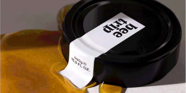 艾利AWS465典型包裝封（fēng）口標簽（qiān）的（de）銅版（bǎn）紙不幹膠材料